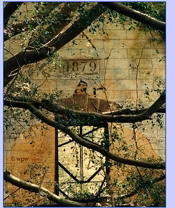 <Sign of 1879 on old maui sugar mill wall>